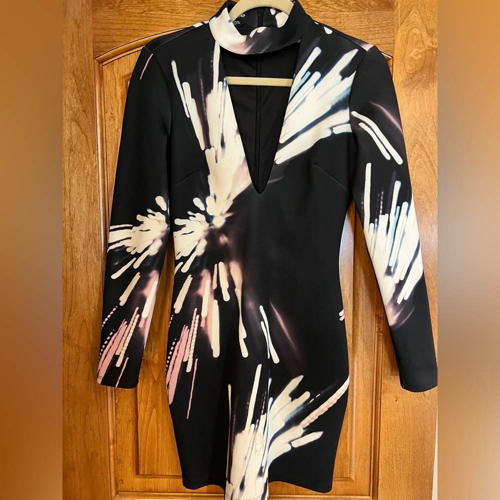 Bebe. Deep V. Long sleeve mini dress.